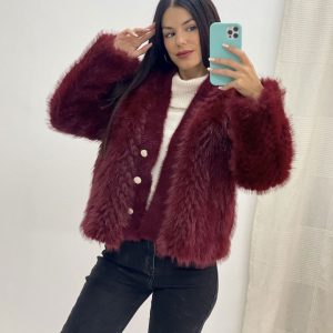 Rebeca pelo botones dorados